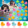 Assorted mini silicone rubber ducks in various colors like yellow, pink, and green for bath and play