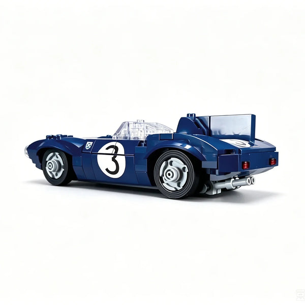 Ein blaues Le Mans-Rennbahn-Bausteinset mit einem Rennwagenmodell mit der Nummer 3