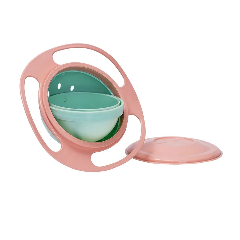 A pink splash-proof gyro bowl with a lid and a matching plate for food