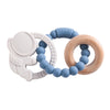 A set of food-grade silicone planet teethers for babies in white, blue, and natural wood tones.