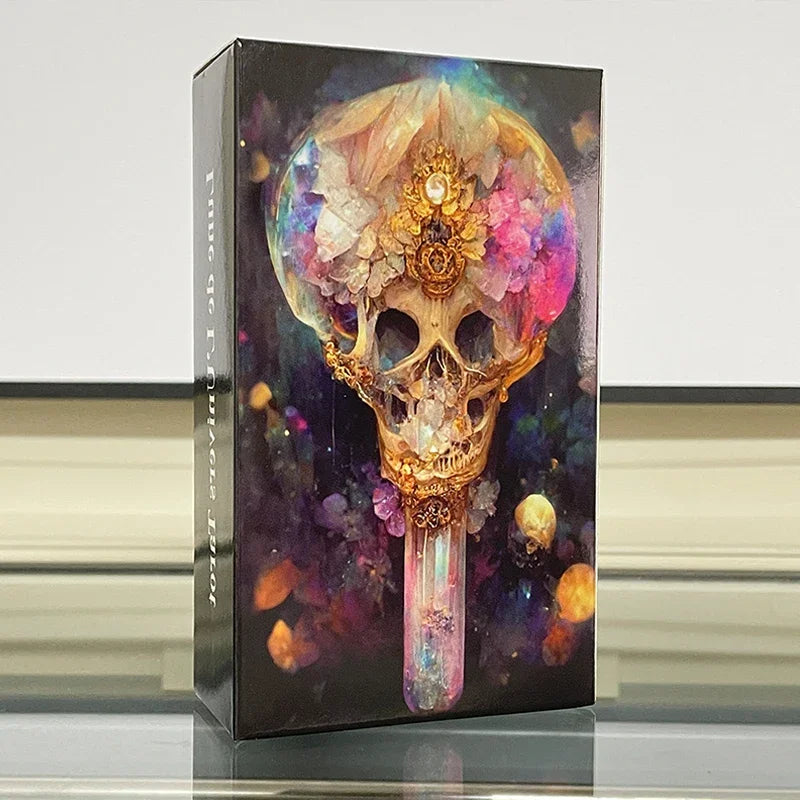 A box for the Lune de L'Univers Tarot Deck featuring a detailed skull design with colorful, ethereal elements.