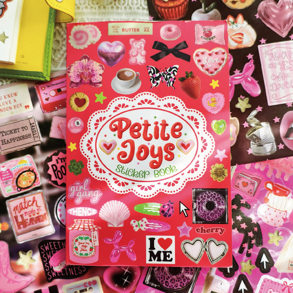 A vibrant sticker book featuring various cute and colorful decorative stickers for scrapbooking.
