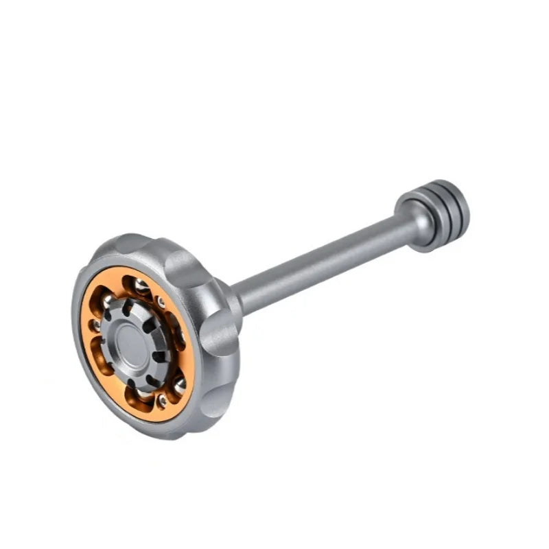 A silver metal fingertip windmill fidget toy with a textured grip and a smooth shaft.