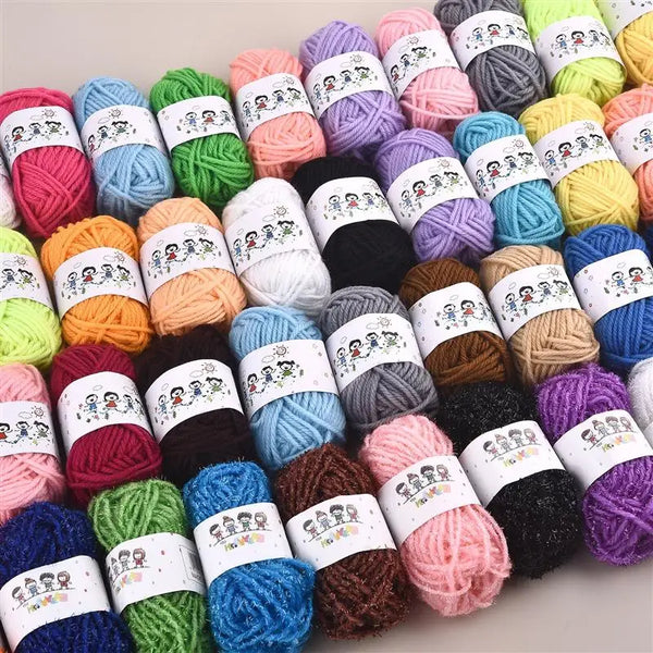 A collection of 12 colors of acrylic yarn balls for knitting and crochet projects.