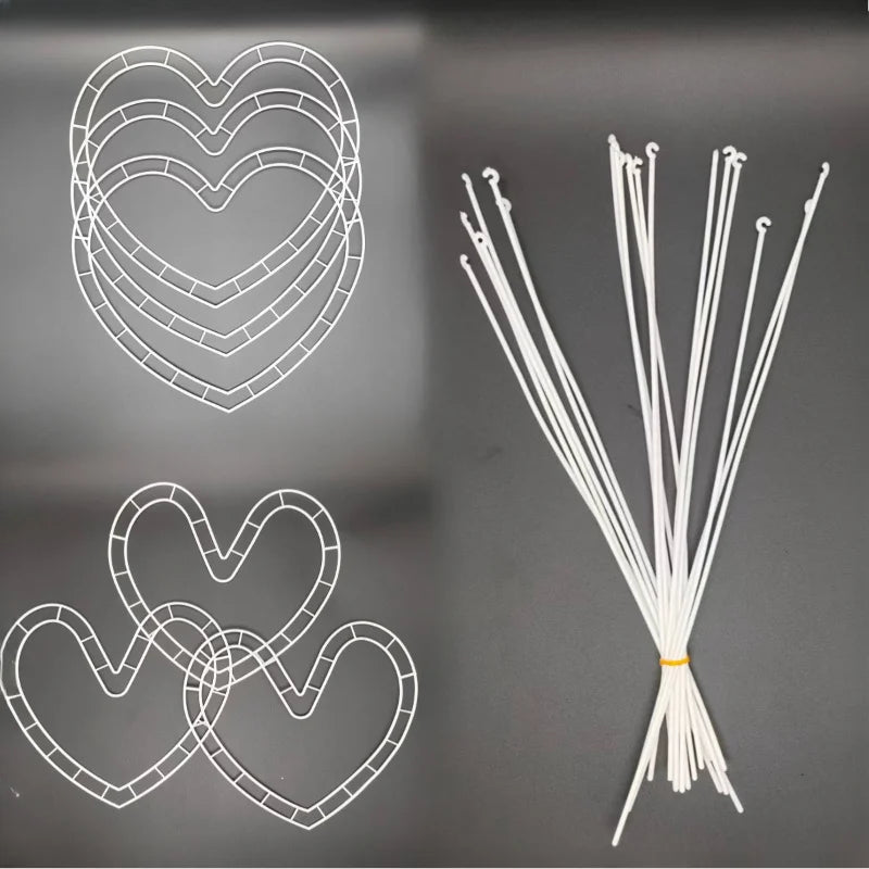 A set of heart-shaped flower holders for DIY bouquets, shown as wire frames and finished white sticks.