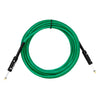 Green professional instrument cable with noise reduction shielding coiled and featuring black connectors