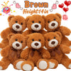 Three brown teddy bears with soft fur and brown bows are displayed together.