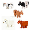 A set of six building blocks depicting various African wildlife animals including a cow, a donkey, and a rhinoceros.