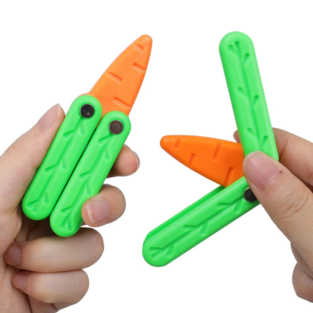 A hand holds a bright green and orange 3D printed butterfly knife fidget toy designed for stress relief.