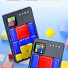 A close-up of a black electronic magic puzzle game with colorful blocks on a blue background.