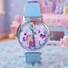 A colorful blind box watch featuring a rainbow design on a blue strap, displayed on a light blue surface.
