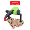 A set of wooden train track accessories featuring airport and gas station scenes.