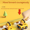 A hand presses a head to make an animal car toy slide forward on a track.