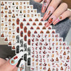 A collection of 12 sheets of vintage angel and saint nail art stickers featuring cherubs and crosses