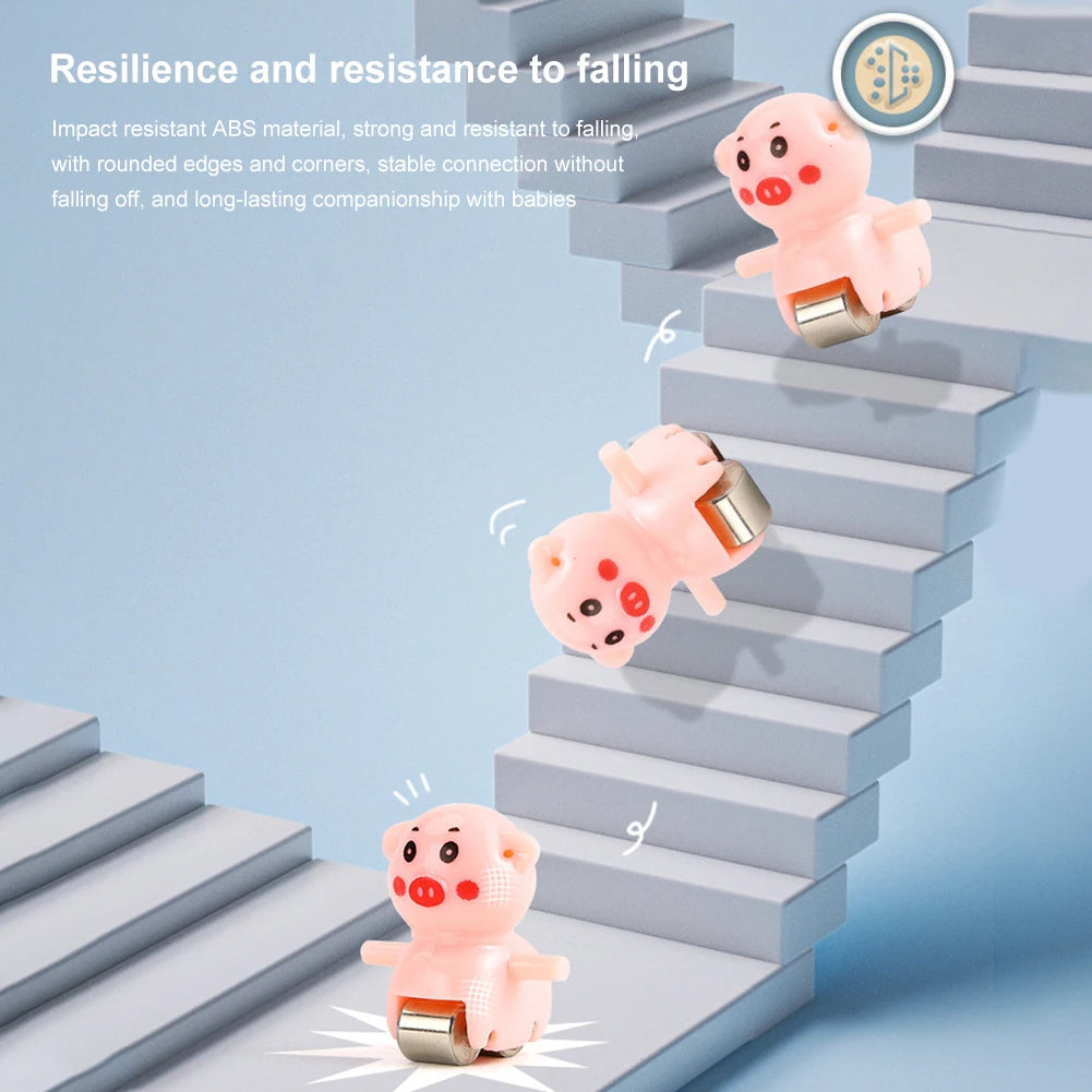 Pink piggy-shaped toy designed to be resilient and resistant to falling while climbing stairs.