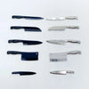 A collection of miniature metal kitchen knives in various sizes and finishes for a dollhouse.