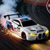 A white 4WD RC drift car with blue and red accents is speeding on a track, emitting bright light trails.
