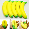 A set of bright yellow banana stress reliever toys shown from various angles.