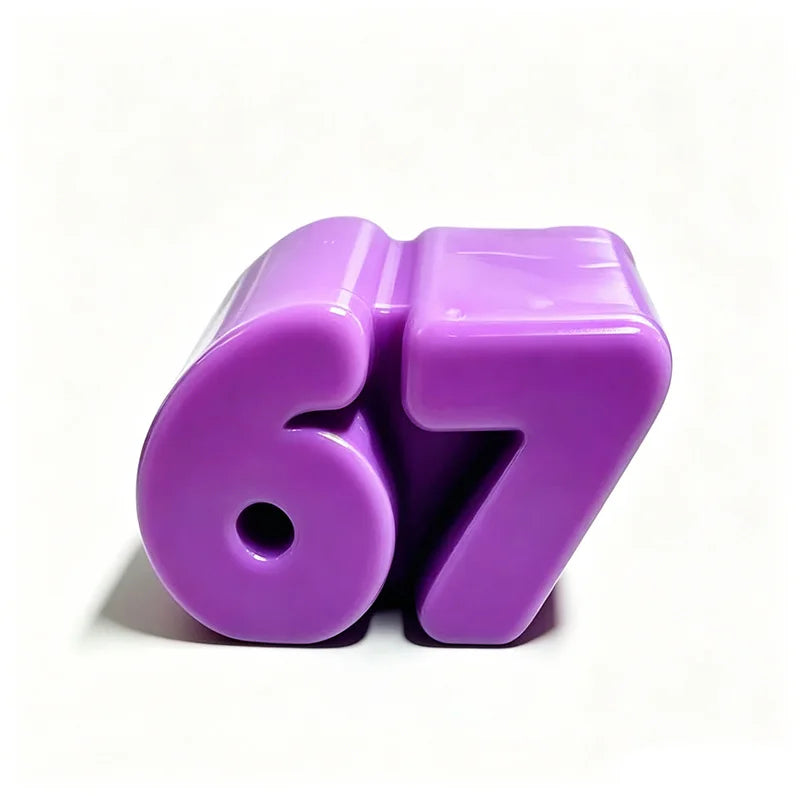 A purple squeeze stress relief toy shaped like the number 67.