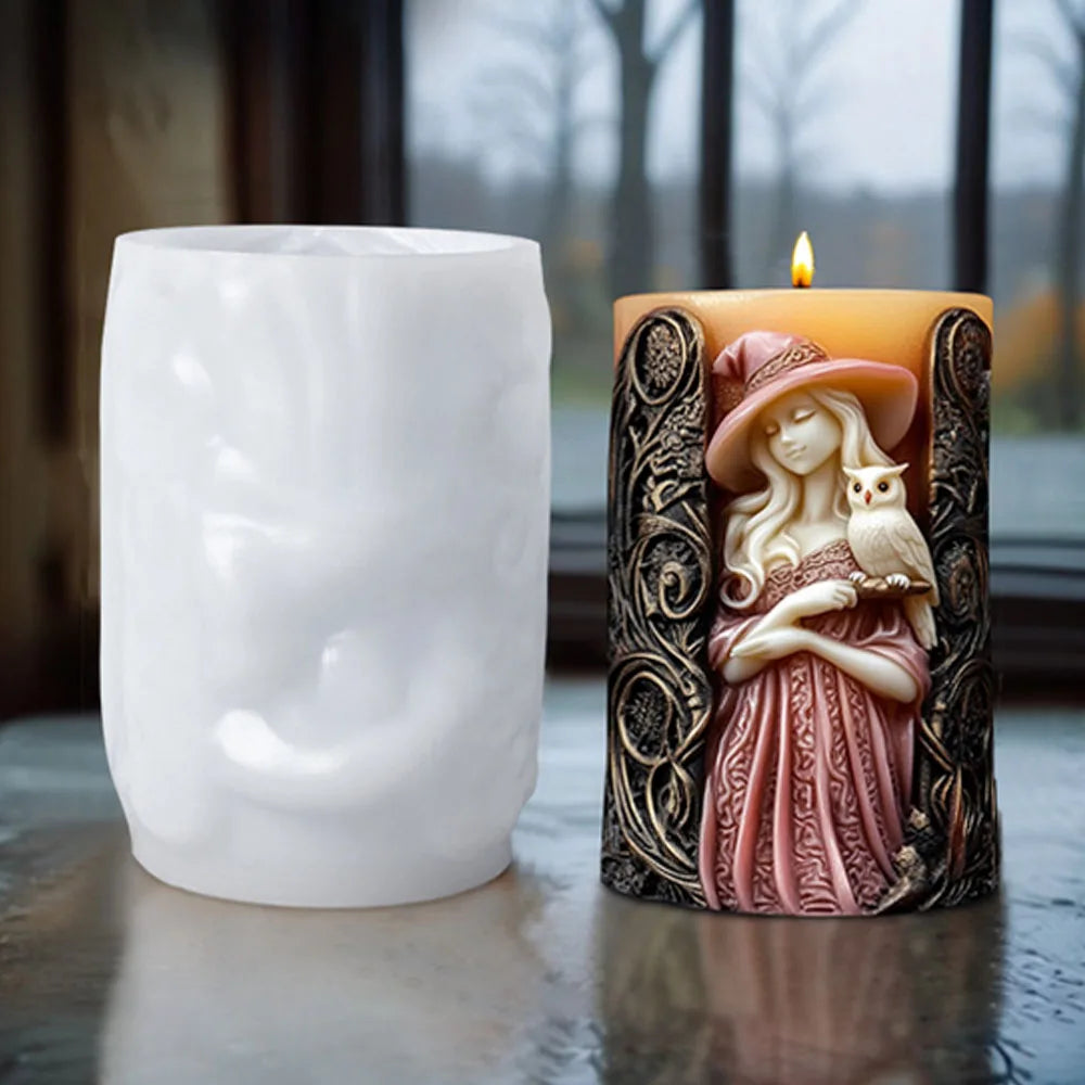 A silicone candle mold shaped like a witch portrait with a hat and a cat, set next to a lit candle.