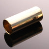 A polished stainless steel guitar slide bar with a reflective glass end, shown in profile.
