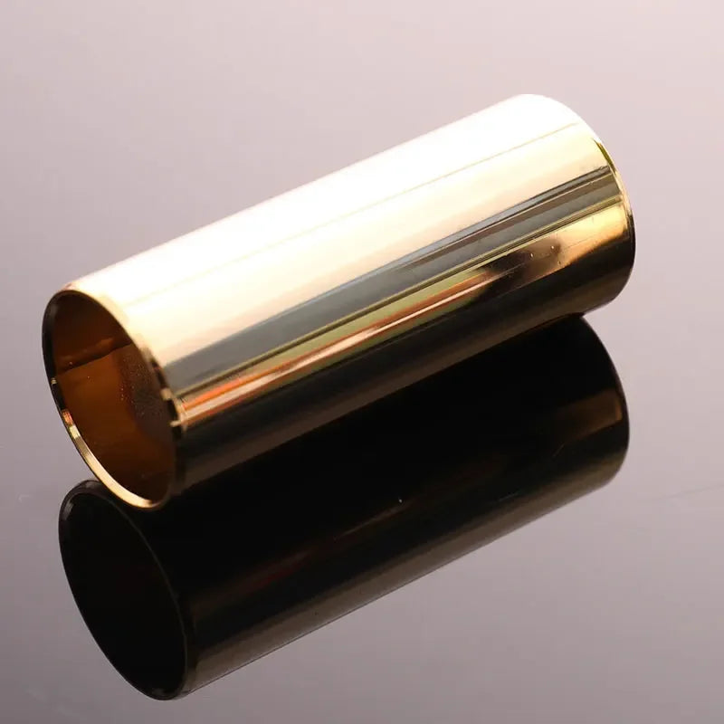 A polished stainless steel guitar slide bar with a reflective glass end, shown in profile.