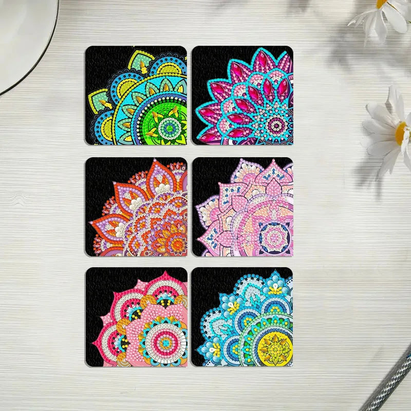 A set of six square bookmarks featuring colorful mandala flower designs in pink, teal, and yellow.