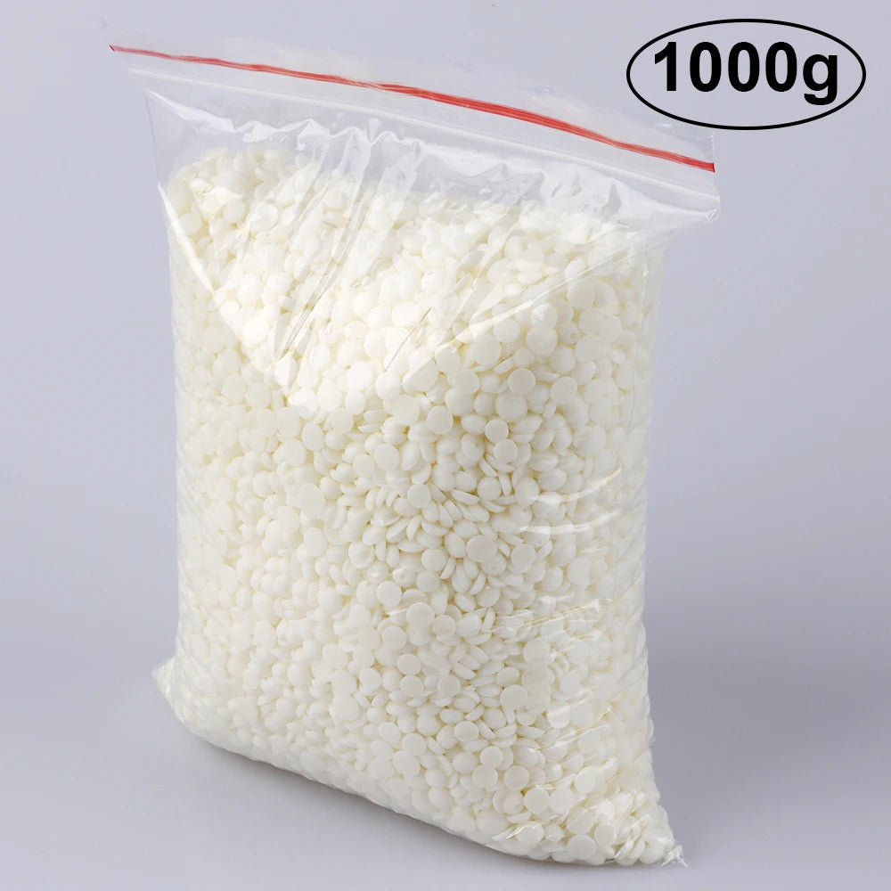 A bag of 1000g of white natural beeswax pellets for DIY candle making and skincare.
