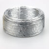 Silver flexible aluminum craft wire coiled into a circular ring for jewelry making
