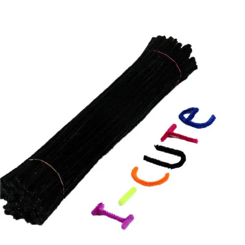A black tube of chenille stem craft pipe cleaners with a pink thread visible.