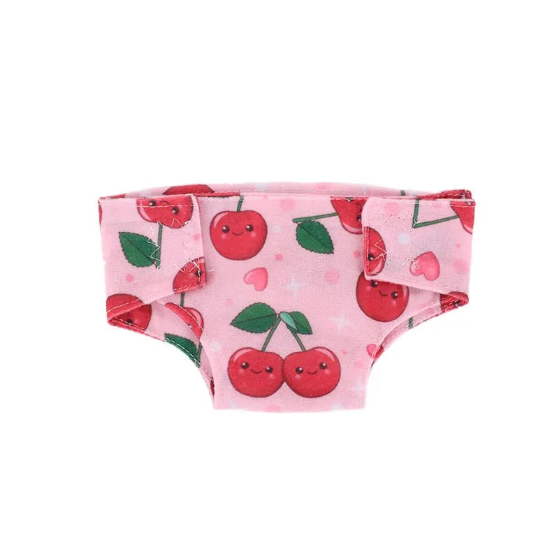 Pink soft doll underwear featuring a pattern of red apples and green leaves