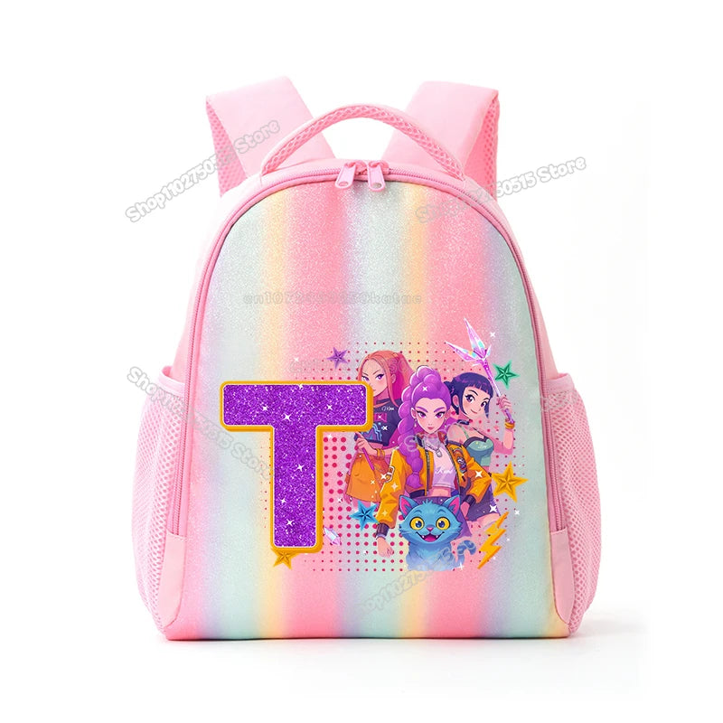 Pink backpack featuring a large purple letter T and anime characters on the front
