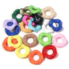 Assortment of candy colored acrylic spacer beads in various pastel and bright shades