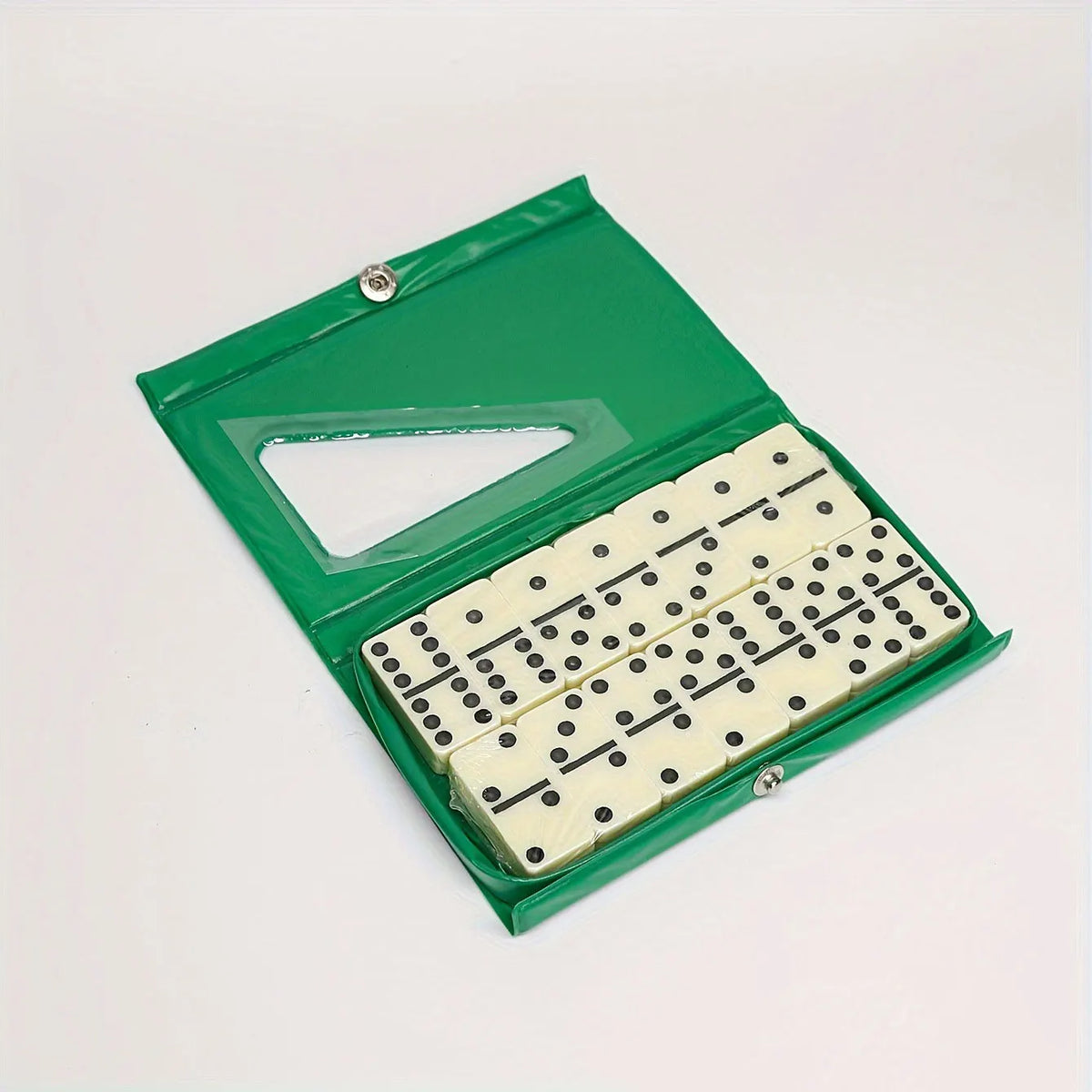 A green domino box with a clear window showing a set of white and black domino tiles.