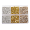 A clear plastic container holds various colors of crushed glass stones for resin and craft projects.