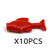 A bright red plastic shark building block.