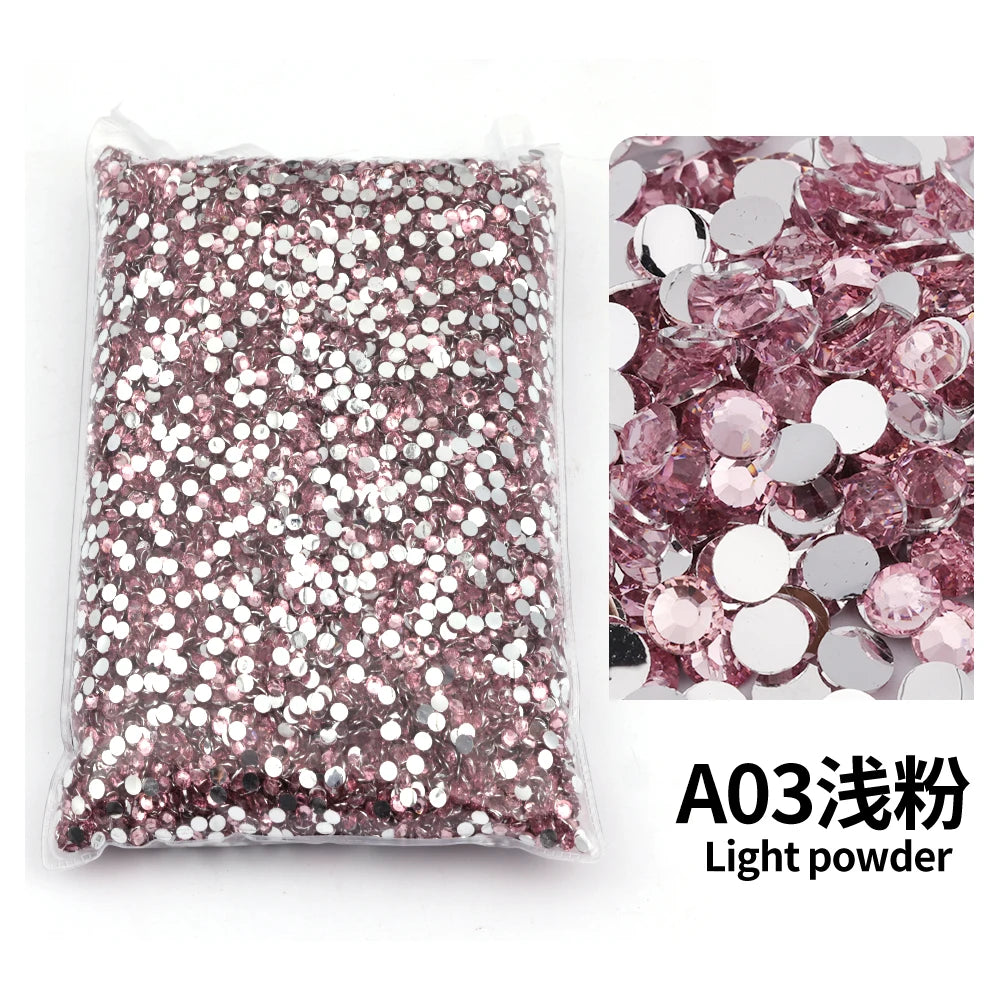 Bag of pink glitter light powder resin rhinestones for DIY craft and nail art