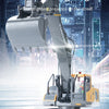 A yellow remote control construction excavator truck with cool lighting operating on a street scene.