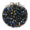 A collection of round, iridescent blue and gold resin beads in a silver-toned container with a bow.