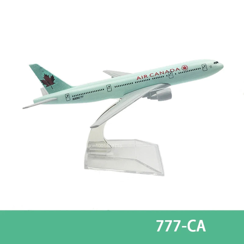 Diecast model of an Air Canada Boeing 777 aircraft in light green and white.