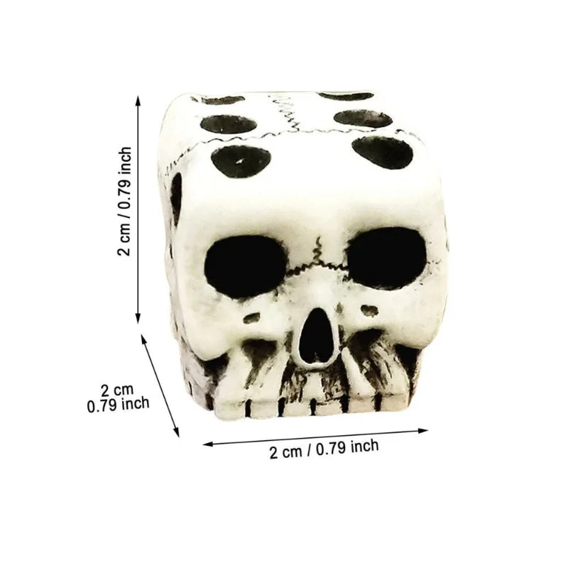 A white skull dice set with markings, shown from the top and side views.