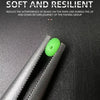 A bright green luminous fishing bead is shown inside a black tool or guide.