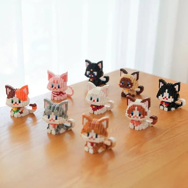 A collection of cat-themed miniature building blocks in various colors and styles.