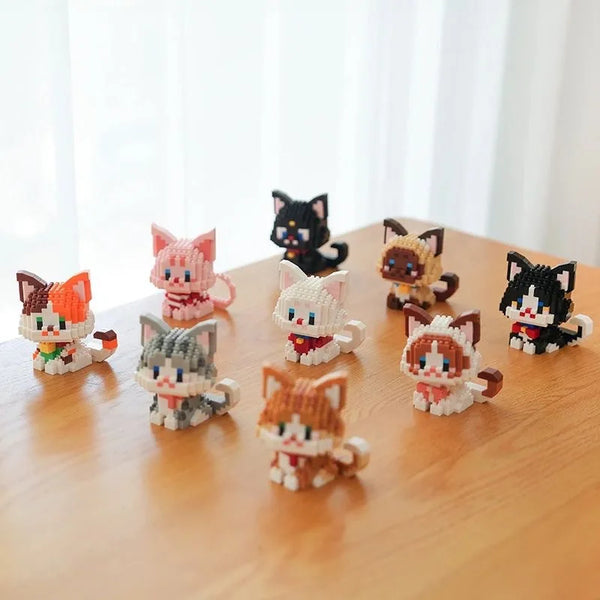 A collection of cat-themed miniature building blocks in various colors and styles.