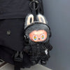 Labubu doll outfit set featuring a black bear hoodie with headphones and a fluffy rabbit ear accessory.