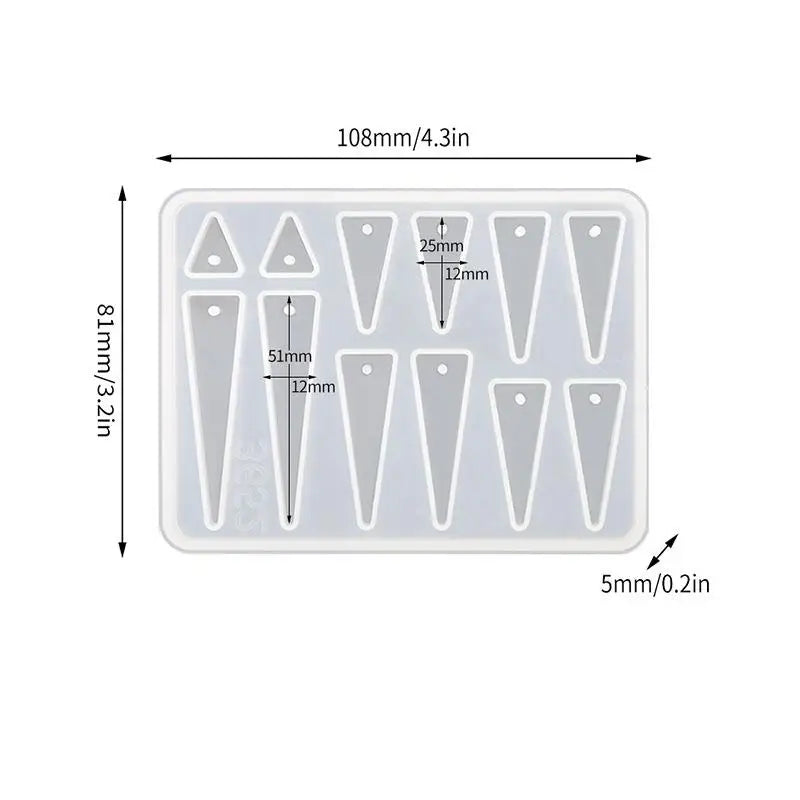 A white silicone mold set with various geometric shapes for making epoxy resin earrings and pendants.