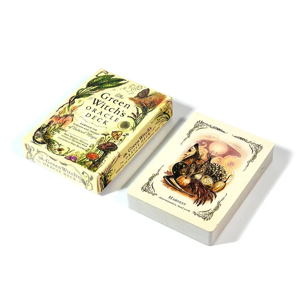 A box of The Green Witch's Oracle Deck featuring botanical illustrations and mystical imagery.