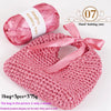 Pink satin ribbon yarn and a finished pink knitted heart bag display