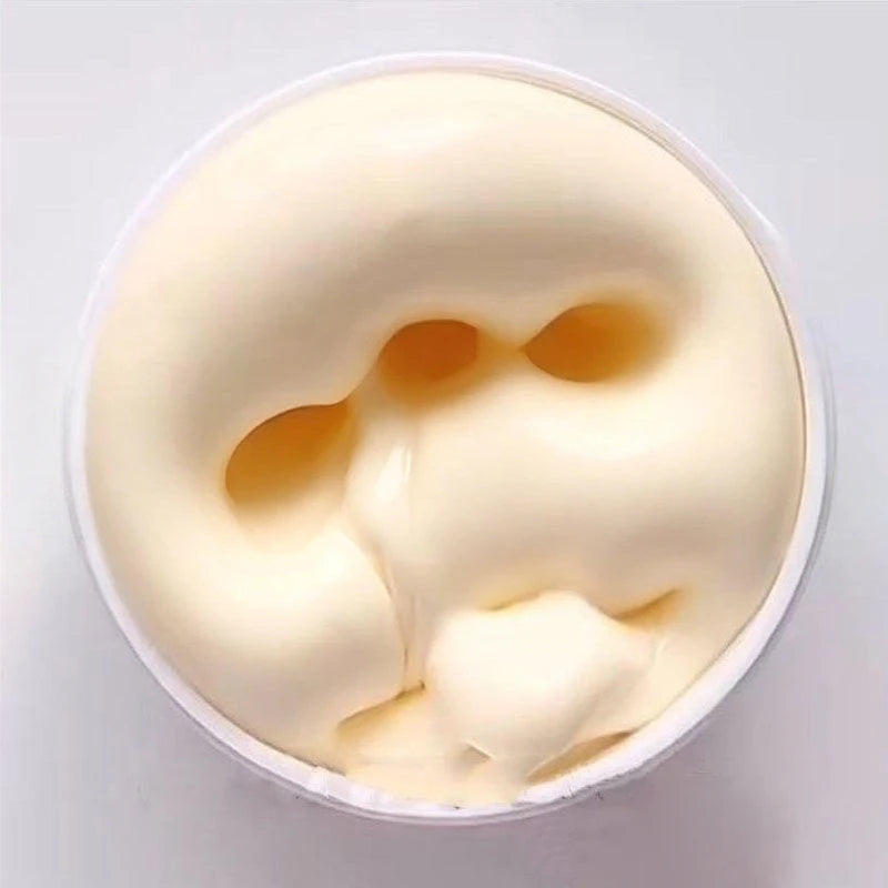 A clear, thick, pale yellow slime product in a circular container.