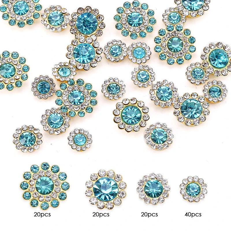 A collection of crystal glass sunflower claw rhinestones in various shades of blue and clear, packaged for sewing.